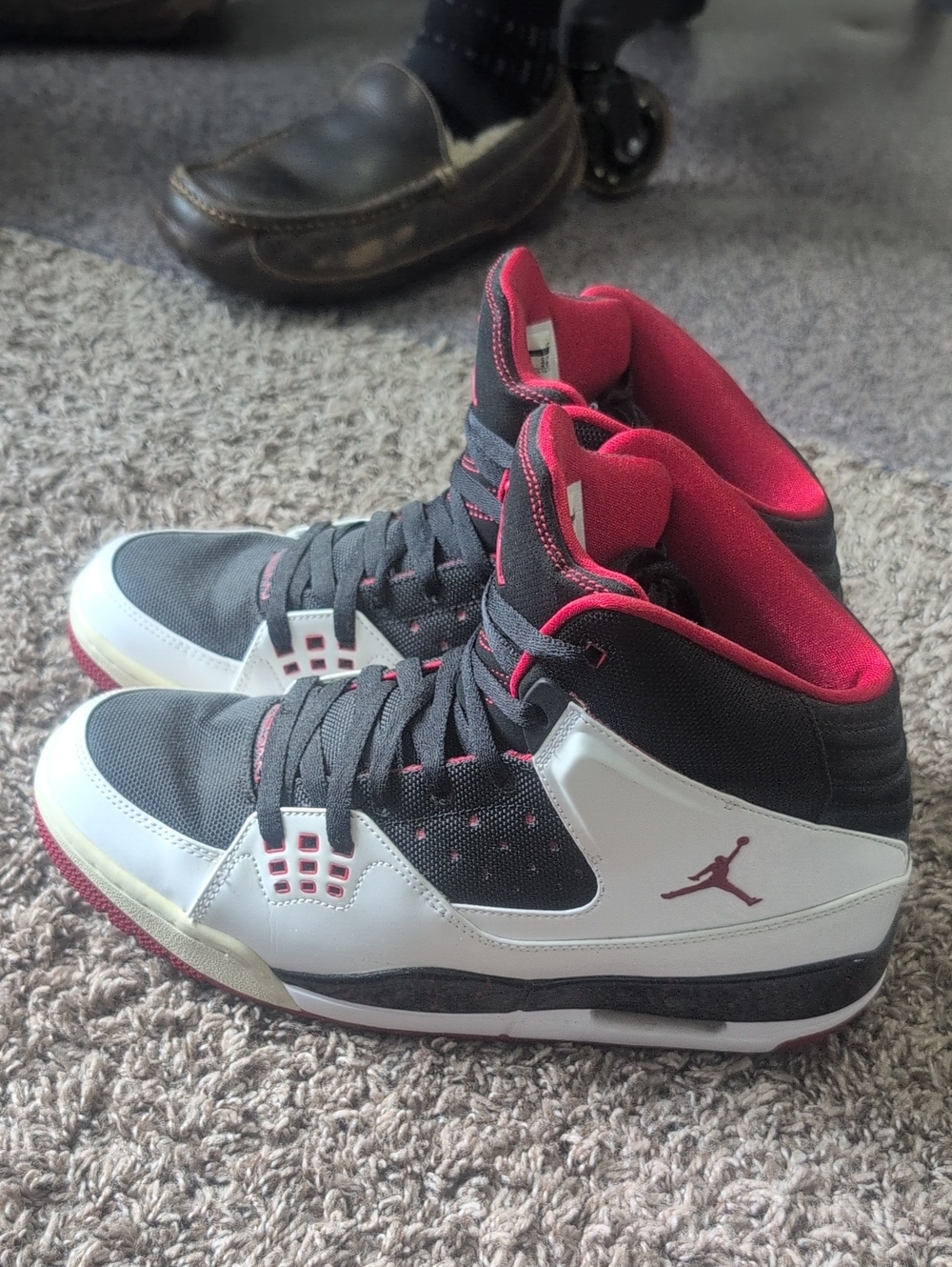 Jordan High-Top Sneakers in Black, White & Red
